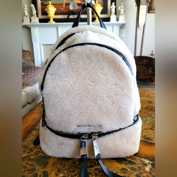 Michael Kors Handbags - Michael Kors Shearling Backpack in Cream by Michael Kors]